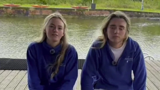 Two Outdoor Adventure Leadership students sitting on a bench by the water, reflecting on their college experience. Two Outdoor Adventure Leadership students sitting on a bench by the water, reflecting on their college experience.